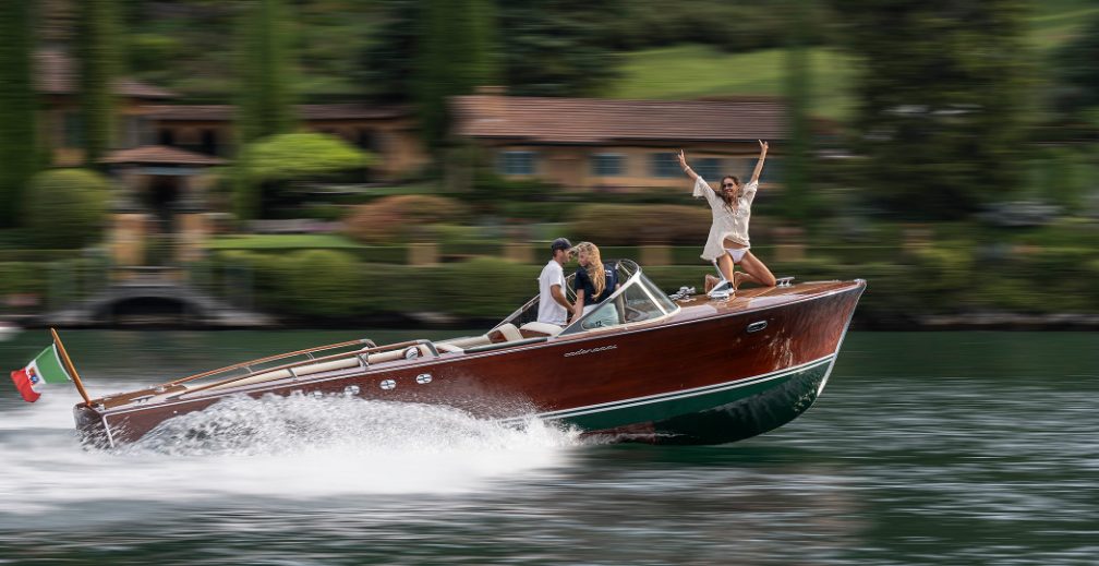 Boat cruising across Lake Como